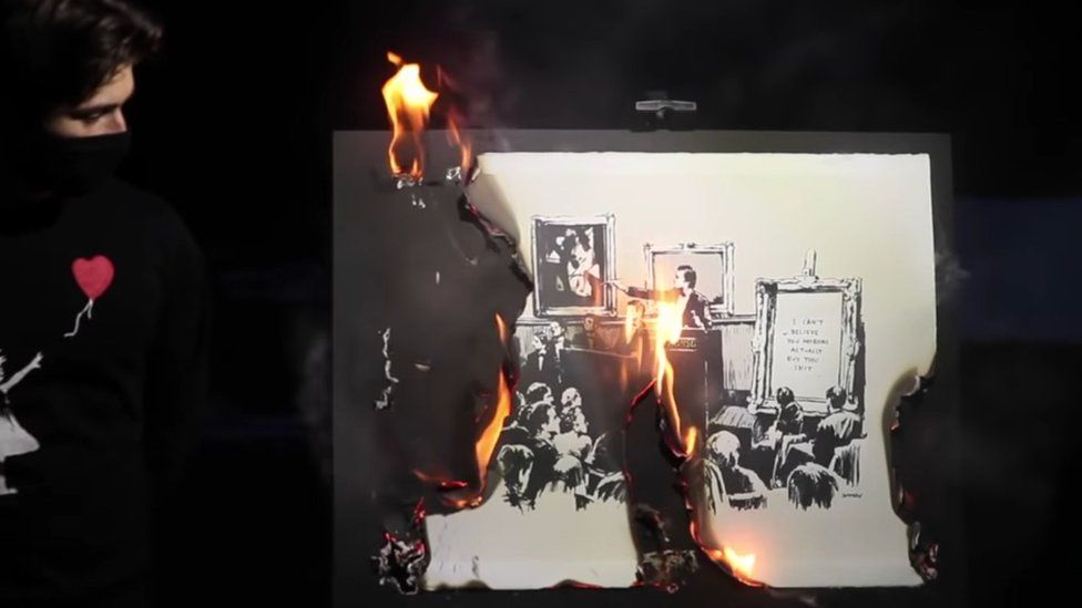 The artwork was burnt in a video livestreamed from a park in New York.jpg