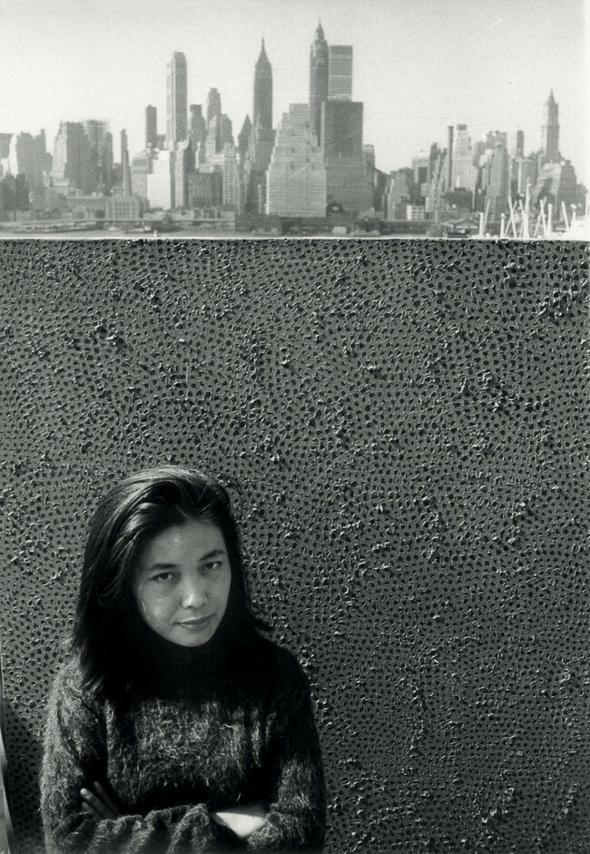 8Yayoi Kusama with one of her Infinity Net paintings in New York, c. 1961.jpg