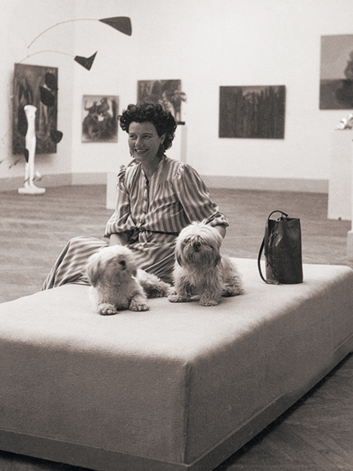 Peggy Guggenheim with her collection in the Greek pavilion at the Venice Biennale, 1948.jpg